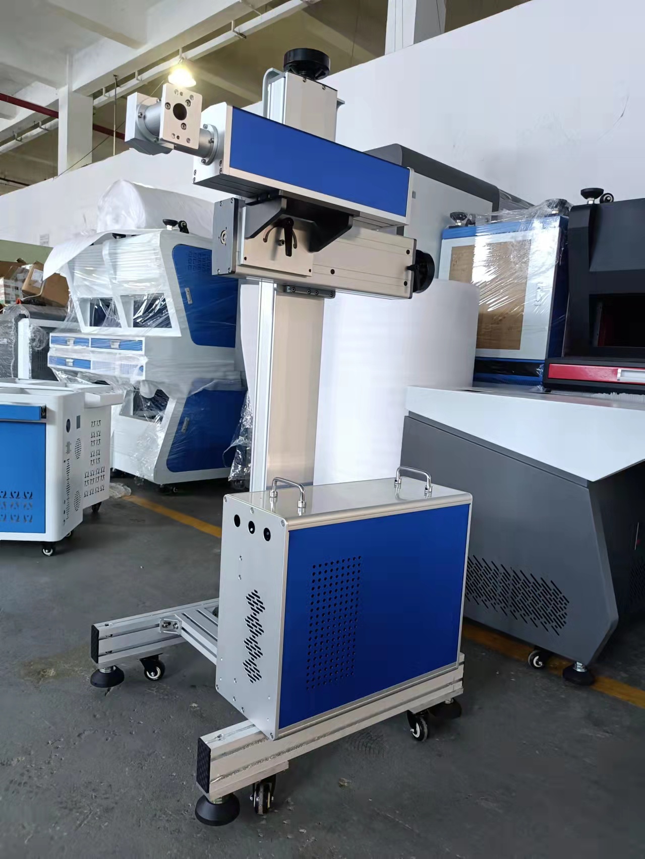 Fiber flying laser engraver